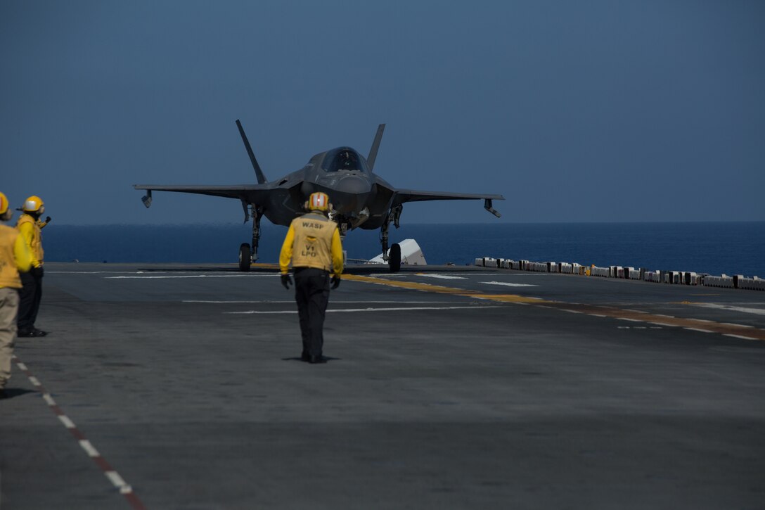 An F-35B Lightning II fighter aircraft, with Marine Medium Tiltrotor Squadron 265 (Reinforced) prepares for take-off during flight operations while underway in the Philippine Sea, June 5, 2019. The 31st MEU, the Marine Corps` only continuously forward-deployed MEU, provides a flexible and lethal force ready to perform a wide range of military operations as the premier crisis response force in the Indo-Pacific region. (Official U.S. Marine Corps photo by Lance Cpl. Kenny Nunez Bigay)