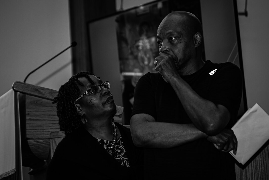 Peter Hall Sr., right, and Jennifer Hall, Senior Airman Aaron Hall’s parents, pause while speaking during a memorial service at the Palmetto Chapel at Shaw Air Force Base, South Carolina, June 5, 2019.