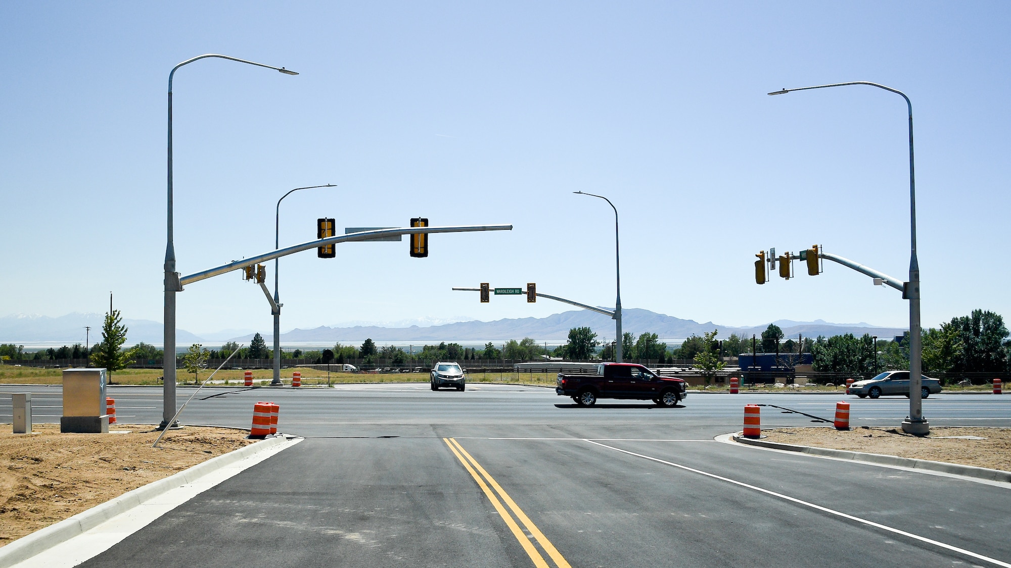 Construction of a new traffic light at the intersection of Arsenal Road and Wardleigh Boulevard was completed June 11, 2019, at Hill Air Force Base, Utah. Motorists and pedestrians should be aware of the new signal and continue to obey all traffic safety laws as they travel through the area. Officials said the increasing volume of traffic and the safety of motorists along Wardleigh is the reason for the new traffic signal. For more information, call 801-586-2559.