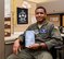 U.S. Air Force Airman sits in chair