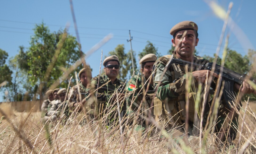 Peshmerga soldiers prepare to conduct a squad movement exercise at Bnaslawa Training Center near Erbil, Iraq, May 22, 2019.  The exercise was led by local trainers under the guidance of Italian Army instructors.  The soldiers are among more than 500 Peshmerga soldiers participating in 10 weeks of training with the support of Coalition Forces.  At the invitation of the Government of Iraq, members of the Global Coalition provide training and advice to local forces in support of the enduring mission to defeat Daesh. (U.S. Army photo by Spc. Kahlil Dash)