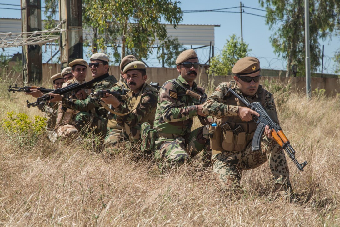 Peshmerga soldiers prepare to conduct a squad movement during a wide area security exercise at Bnaslawa Training Center near Erbil, Iraq, May 22, 2019.  The exercise was led by Peshmerga trainers under the guidance of Italian Army instructors.  The soldiers are among more than 500 Peshmerga soldiers participating in 10 weeks of training with the support of Coalition Forces.  At the invitation of the Government of Iraq, members of the Global Coalition provide training and advice to local forces in support of the enduring mission to defeat Daesh. (U.S. Army photo by Spc. Kahlil Dash)