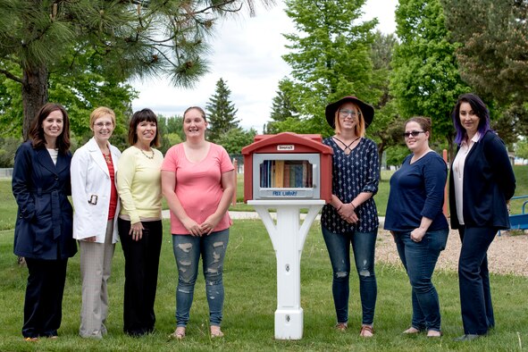 Kelly Barrett (third from left), 18th Air Force commander spouse, and Trish Simpson (far right), 18th AF command chief spouse, pose for a photo with Team Fairchild key spouses at Fairchild Air Force Base, Washington, May 21, 2019. Barrett and Simpson visited Fairchild to gain insight about Team Fairchild Key Spouse efforts that aid Airmen’s families. (U.S. Air Force photo by Airman 1st Class Whitney Laine)