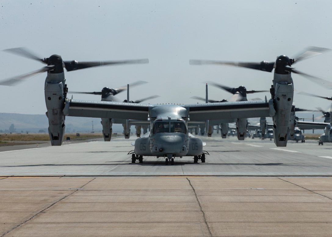 U.S. Marine Corps MV-22B Ospreys with Marine Medium Tiltrotor Squadron (VMM) 161, Marine Aircraft Group (MAG) 16, 3rd Marine Aircraft Wing (MAW), prepare to fly at Marine Corps Air Station Miramar, Calif., June 6, 2019. In a dynamic display of combat power that featured over 40 aircraft in MAG-16’s mass flight, the aircraft showcased the tactical capabilities and power that the Marine Air Ground Task Force uses to defend the nation. (U.S. Marine Corps photo by Lance Cpl. Cheng Chang)