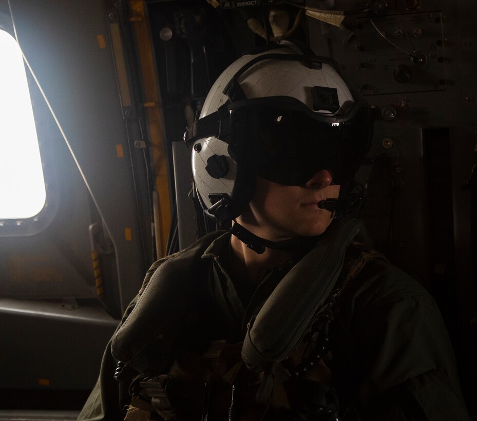 A U.S. Marine crew chief with Marine Aircraft Group (MAG) 16, 3rd Marine Aircraft Wing (MAW), observes his surroundings during MAG-16’s mass flight exercise at Marine Corps Air Station (MCAS) Miramar, Calif., June 6, 2019. 3rd MAW Marines’ invaluable contributions to the operational excellence of equipment and aircraft made MAG-16’s mass launch ensure the units remain trained and ready to serve as an integral component of the Marine Air-Ground Task Force (MAGTF) by providing the aviation combat element for I Marine Expeditionary Force – the Marine Corps’ largest MAGTF. (U.S. Marine Corps photo by Lance Cpl. Raynaldo Ramos)