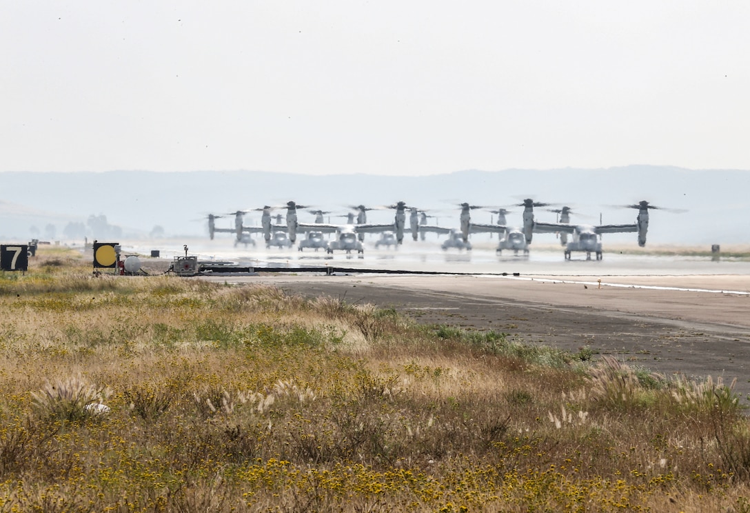 U.S. Marine Corps MV-22B Ospreys with Marine Medium Tiltrotor Squadron (VMM) 161, Marine Aircraft Group (MAG) 16, 3rd Marine Aircraft Wing (MAW), prepare to fly at Marine Corps Air Station Miramar, Calif., June 6, 2019. In a dynamic display of combat power that featured over 40 aircraft in MAG-16’s mass flight, the aircraft showcased the tactical capabilities and power that the Marine Air Ground Task Force uses to defend the nation. (U.S. Marine Corps photo by Sgt. Sarah Ralph)
