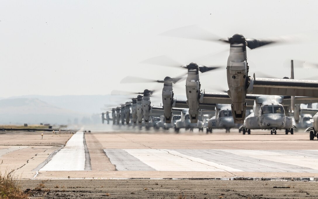 U.S. Marine Corps MV-22B Ospreys with Marine Medium Tiltrotor Squadron (VMM) 161, Marine Aircraft Group (MAG) 16, 3rd Marine Aircraft Wing (MAW), prepare to fly at Marine Corps Air Station Miramar, Calif., June 6, 2019. In a dynamic display of combat power that featured over 40 aircraft in MAG-16’s mass flight, the aircraft showcased the tactical capabilities and power that the Marine Air Ground Task Force uses to defend the nation. (U.S. Marine Corps photo by Sgt. Sarah Ralph)