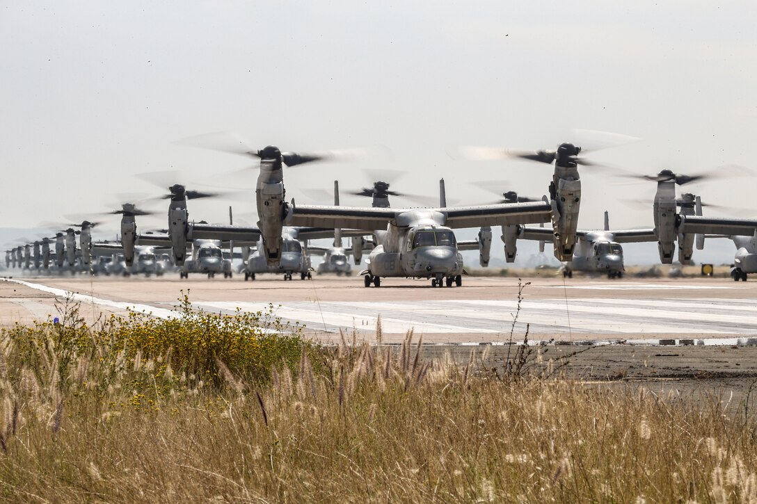 U.S. Marine Corps MV-22B Ospreys with Marine Medium Tiltrotor Squadron (VMM) 161, Marine Aircraft Group (MAG) 16, 3rd Marine Aircraft Wing (MAW), prepare to fly at Marine Corps Air Station Miramar, Calif., June 6, 2019. In a dynamic display of combat power that featured over 40 aircraft in MAG-16’s mass flight, the aircraft showcased the tactical capabilities and power that the Marine Air Ground Task Force uses to defend the nation. (U.S. Marine Corps photo by Sgt. Sarah Ralph)