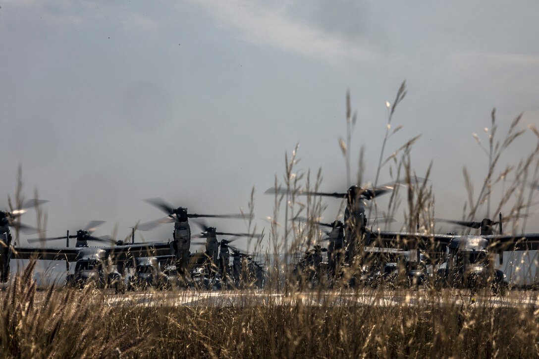 U.S. Marine Corps MV-22B Ospreys with Marine Medium Tiltrotor Squadron (VMM) 161, Marine Aircraft Group (MAG) 16, 3rd Marine Aircraft Wing (MAW), prepare to fly at Marine Corps Air Station Miramar, Calif., June 6, 2019. In a dynamic display of combat power that featured over 40 aircraft in MAG-16’s mass flight, the aircraft showcased the tactical capabilities and power that the Marine Air Ground Task Force uses to defend the nation. (U.S. Marine Corps photo by Sgt. Jake McClung)