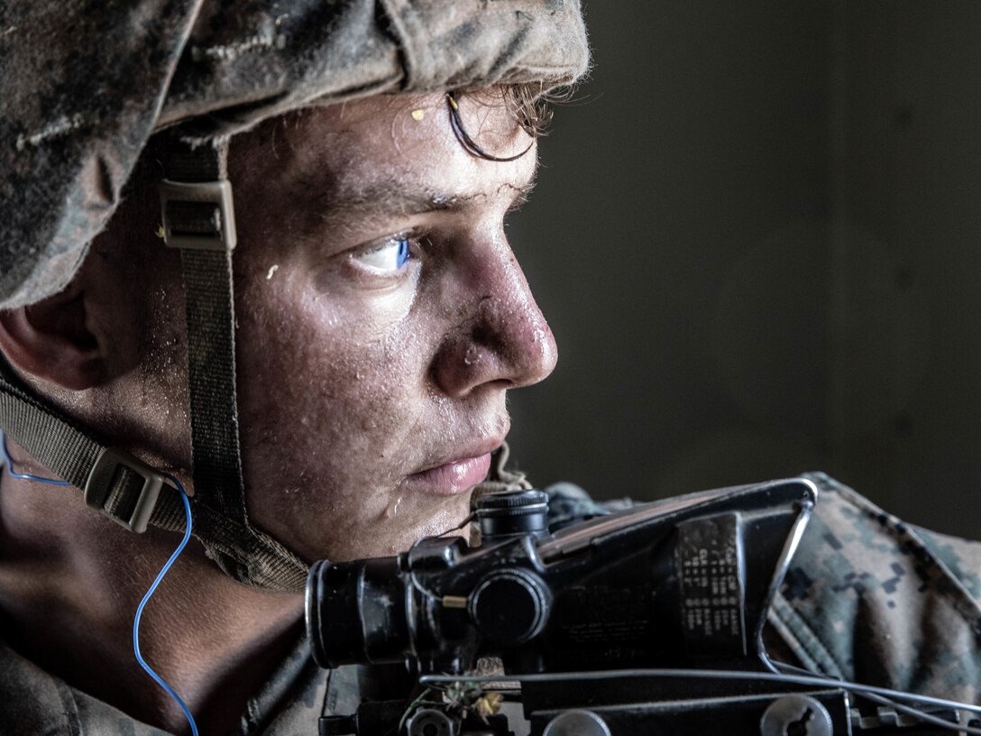A U.S. Marine with Charlie Company, 1st Combat Engineer Battalion, 1st Marine Division provides security during the Sappers Leadership Competition at Camp Pendleton, Calif., June 5, 2019.