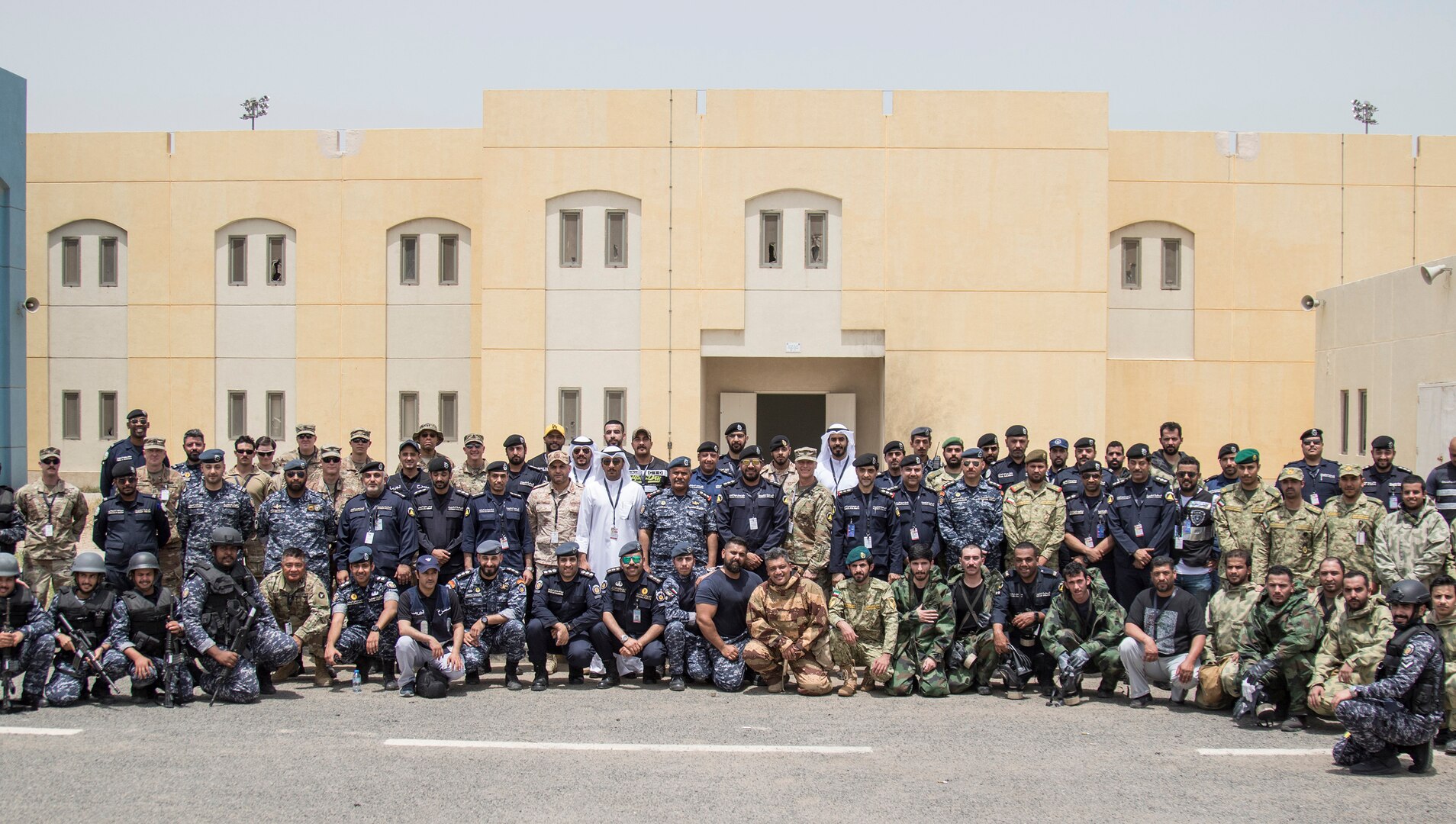 Kuwaiti and U.S. participants of Al Watan One pose for a photo on May 2, 2019 following a joint exercise with a simulated terrorist, explosive ordnance, and chemical situation at the Kuwait Special Forces Training Center. The exercise was crafted to build a shared understanding of Kuwait Civil Authorities and U.S. Forces procedures while reacting to any disaster, natural and manmade alike.