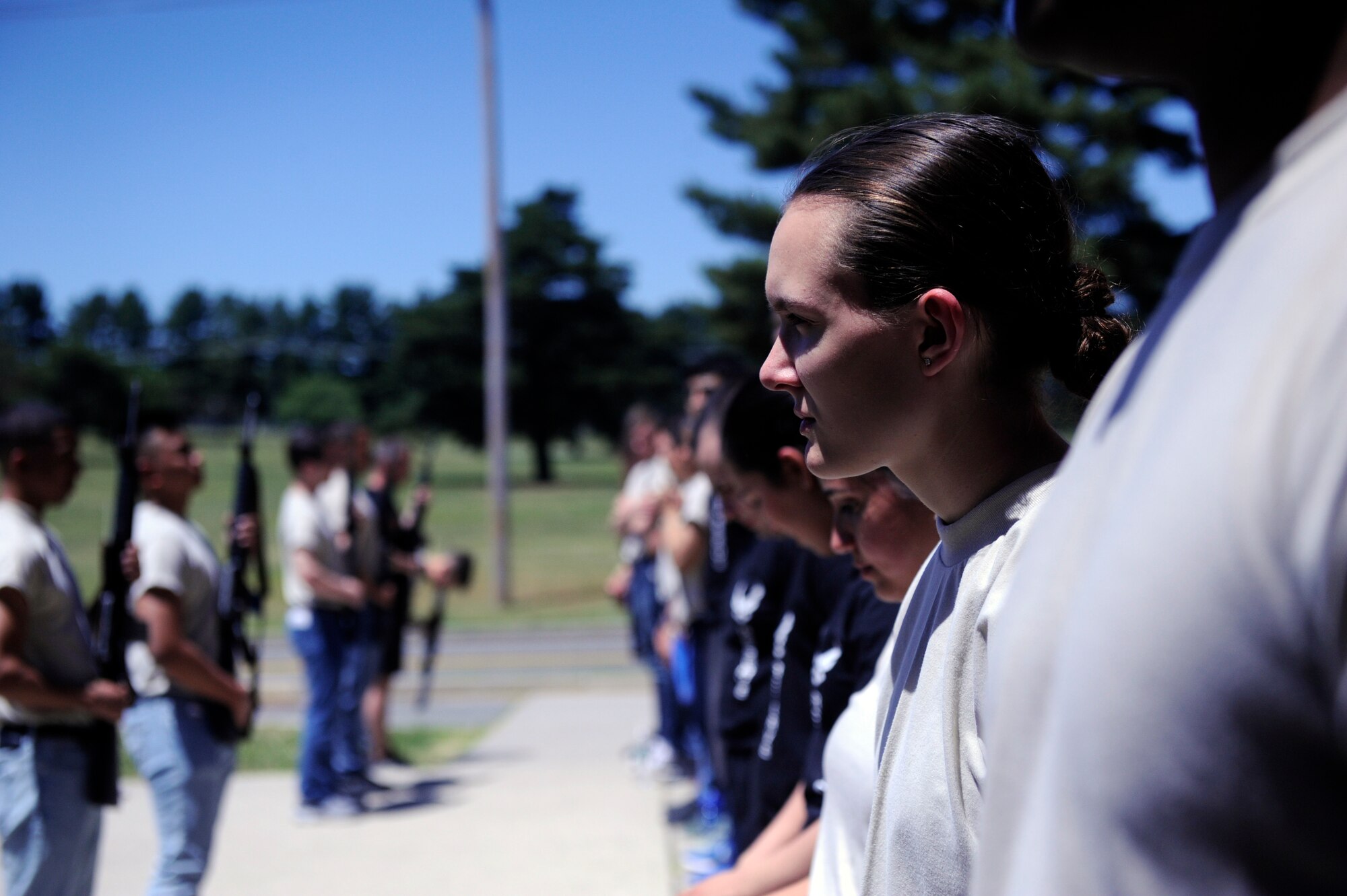 Holley Burns, a member of the Development and Training Flight stands awaiting instructions at the 439th Security Forces Squadron at Westover Air Reserve Base, Mass. June 9, 2019. The DTF members trained with Security Forces officers for the first time in order to prepare for Basic Military Training. (U.S. Air Force photo by Staff Sgt. Tamara Williams)