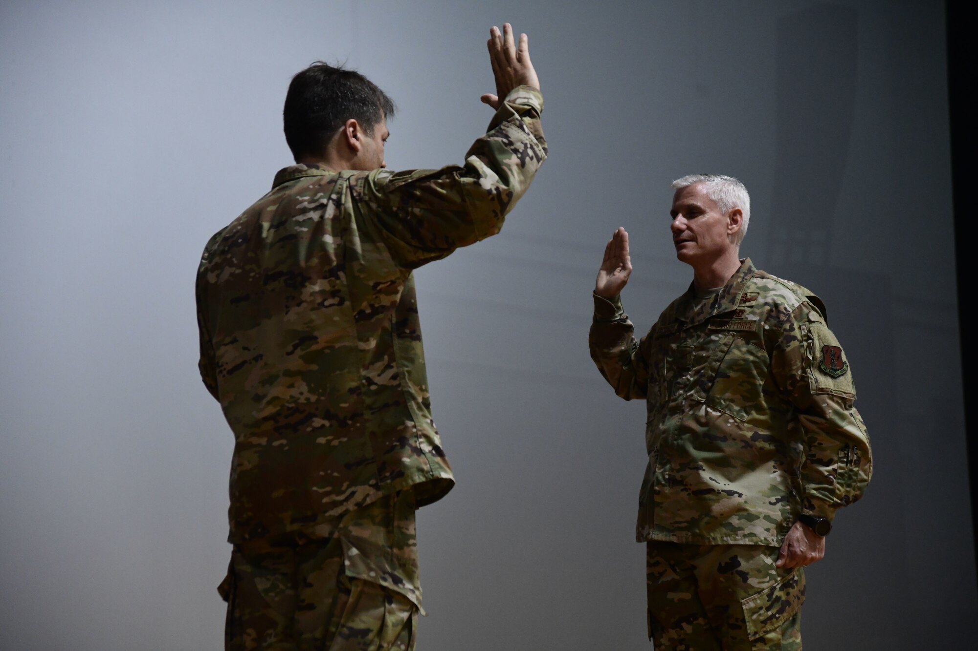 Brig. Gen. Mark A. Maldonado, Deputy Commanding General, Air for the District of Columbia Air National Guard, promotes Col. Keith MacDonald, 113th Wing Commander to the rank of brigadier general the Joint Base Andrews Base Theater, June 9, 2019. (U.S. Air National Guard photo by Staff Sgt. Anthony Small)