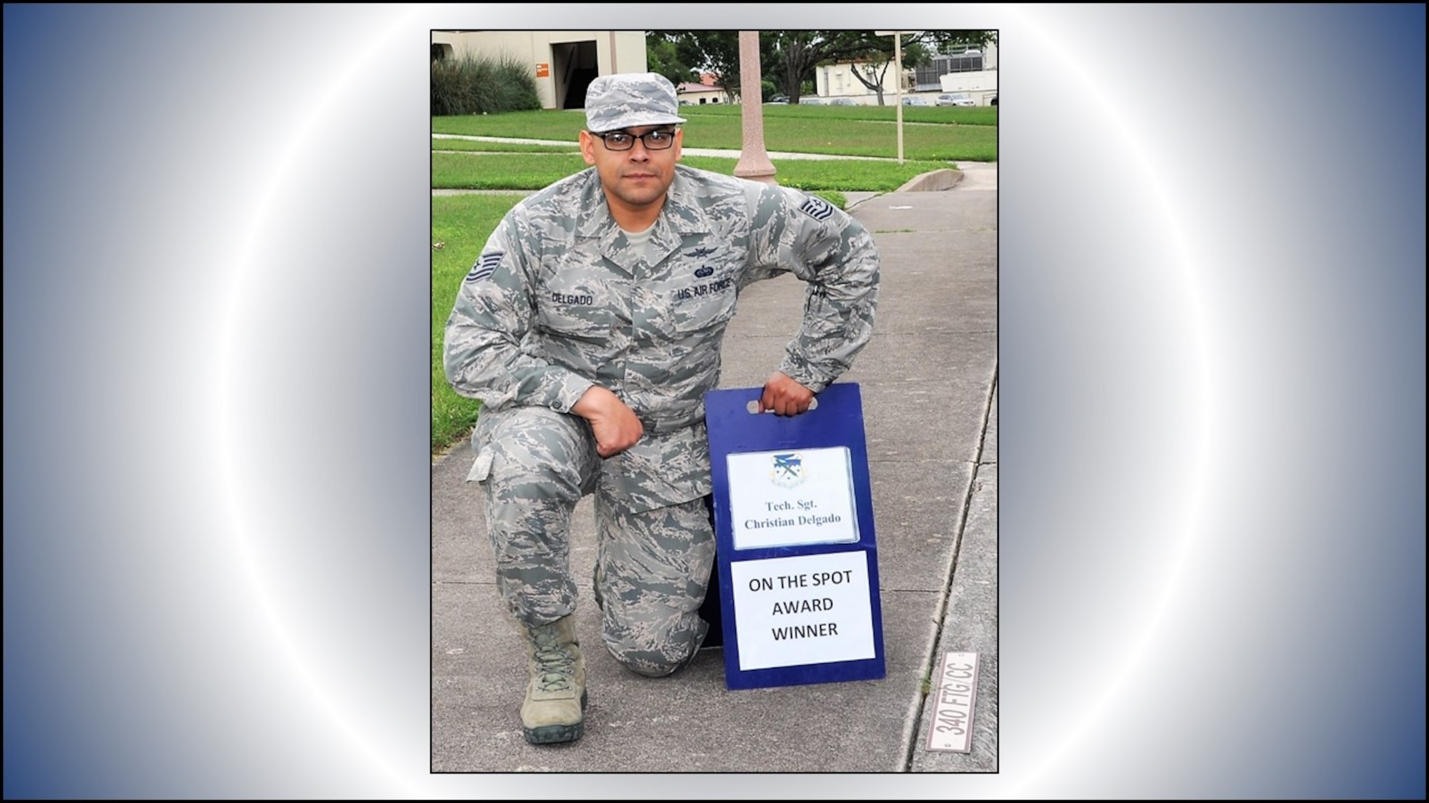 Tech. Sgt. Christian Delgado, 340th Flying Training Group information technology section chief, was named the April On-the-Spot Award winner by Col. Allen Duckworth, group commander. (U.S. Air Force photo by Janis El Shabazz)