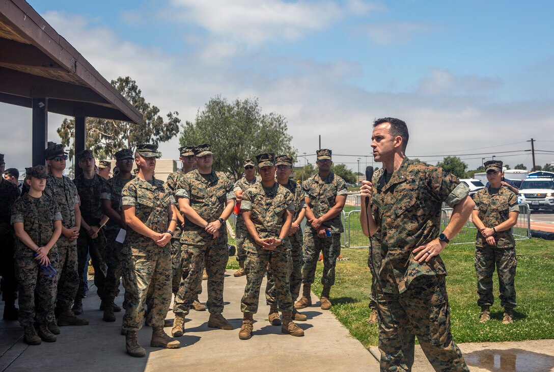 Lt. Col. Allen J. Clarke, commanding officer of Headquarters and Headquarters Squadron (H&HS), thanks the Marines for participating in the Summer bash at Marine Corps Air Station Miramar, Calif., June 7. The annual Summer Bash is held to build unit camaraderie and give the Marines a chance to spend time with fellow Marines amongst the unit. (U.S. Marine Corps photo by Lance Cpl. Raynaldo Ramos)