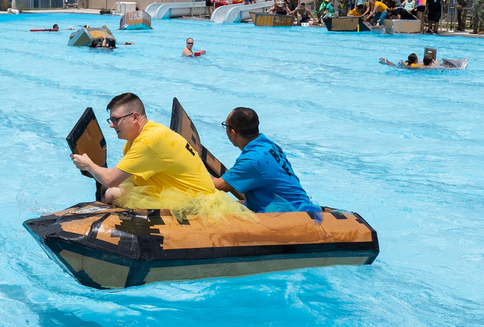 Sailors assigned to Navy Medicine Training Support Command, Defense Health Agency and Navy Medicine Education, Training and Logistics Command completed in a cardboard boat race as part of a Sailor 360 event at the Medicine Education Training Campus at Joint Base San Antonio-Fort Sam Houston. The event was part of Sailor 360, a Navy initiative to develop innovative and creative command-developed leadership programs.