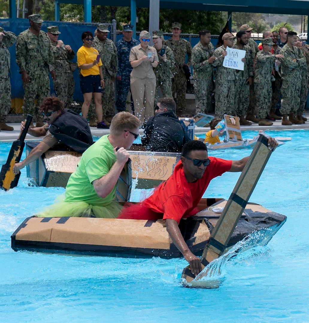 Sailors assigned to Navy Medicine Training Support Command, Defense Health Agency and Navy Medicine Education, Training and Logistics Command completed in a cardboard boat race as part of a Sailor 360 event at the Medicine Education Training Campus at Joint Base San Antonio-Fort Sam Houston. The event was part of Sailor 360, a Navy initiative to develop innovative and creative command-developed leadership programs.