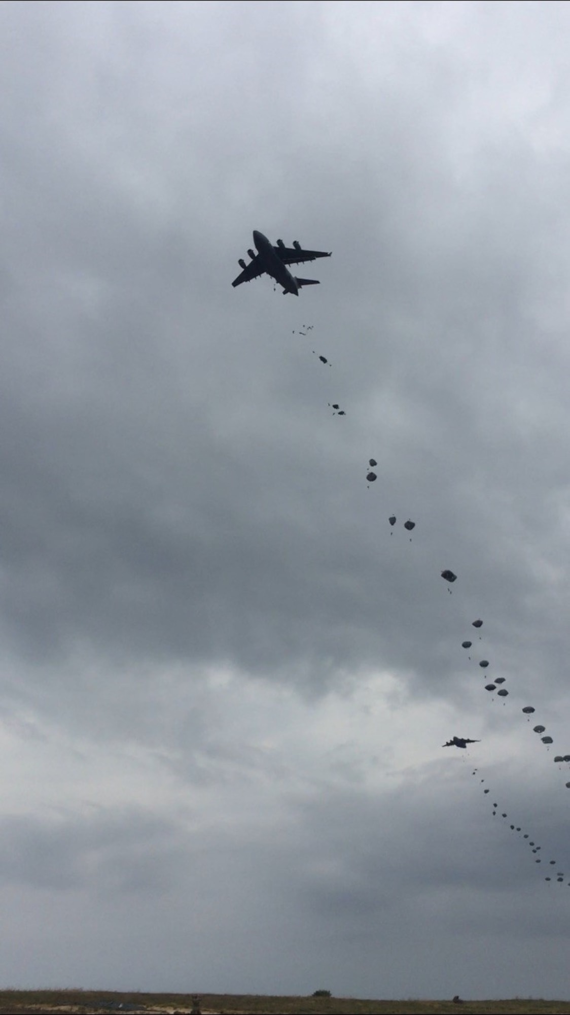 Members of the 82nd Airborne Division conduct an airborne review from a C-17 Globemaster III aircraft during All American Week at Fort Bragg, N.C., May 23, 2019. (U.S. Air Force photo by Maj. Thomas Weber)