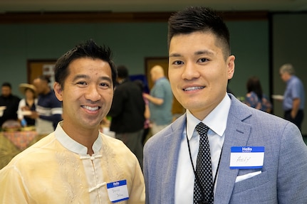 Derrick Delima, Defense Finance and Accounting Service Accounts Maintenance and Control executive assistant, left, and Andy Huynh, U.S. Army Financial Management Command System Support Operations organizational management chief, pose for a photo during an Asian American Pacific Heritage event at the Maj. Gen. Emmett J. Bean Center here June 4, 2019. USAFMCOM and DFAS teamed up to host the event meant to showcase Asian and Pacific Islander heritage, whit this year’s event focused specifically on South Korea and the Philippines. (U.S. Army photo by Mark R. W. Orders-Woempner)