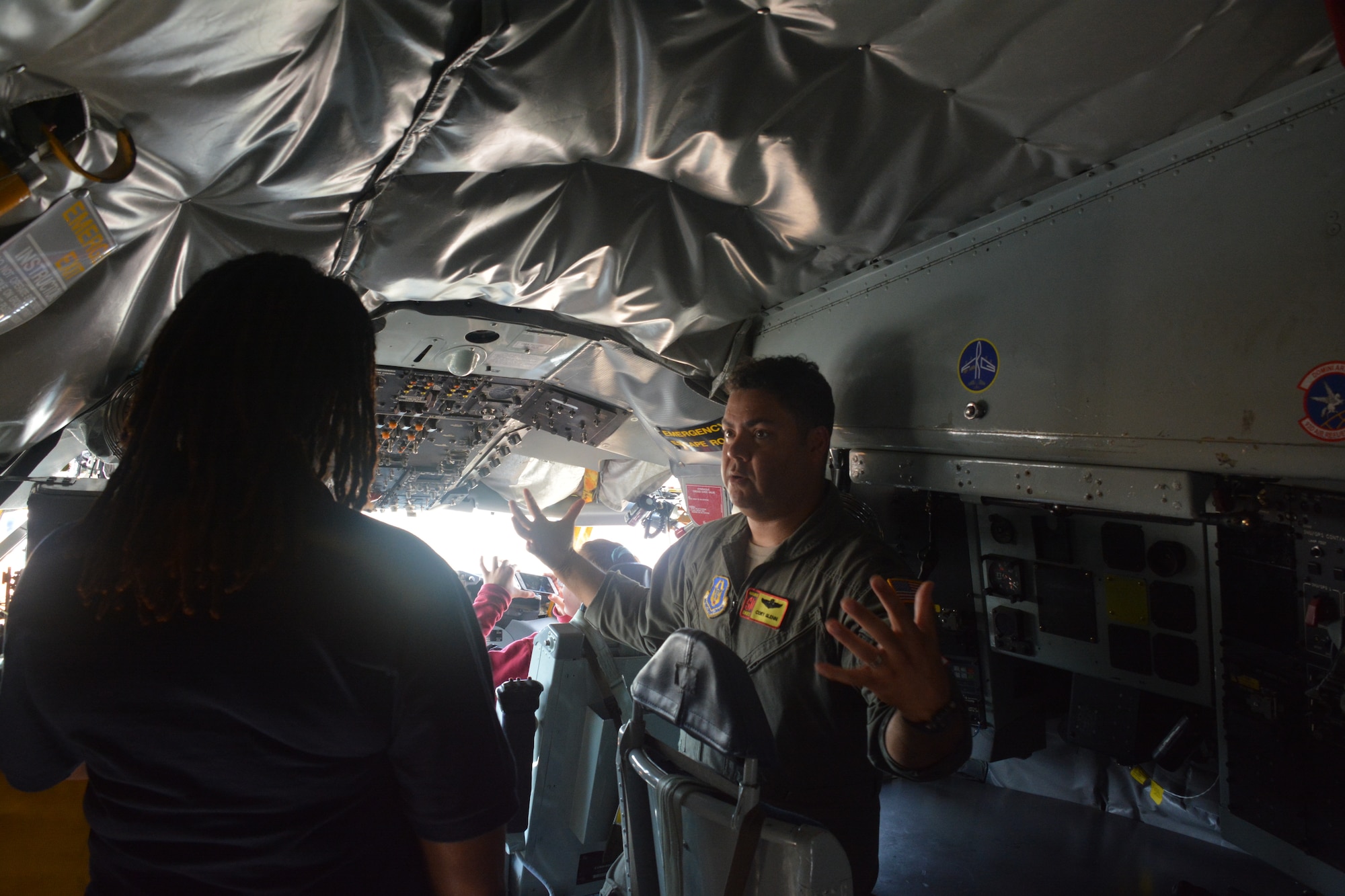 Lt. Col. Cory Glenn, 465th Air Refueling Squadron pilot and ACE Academy coordinator briefs students on the capabilities of an Air Force Reserve KC-135R Stratotanker June 5, 2019. Middle school kids experienced a weeklong immersion in a variety of aviation and aerospace professions. The students received hands-on briefings and tours from pilots operating the KC-135R Stratotanker, F-16 Fighting Falcon and the T-6 Texan II aircraft. (U.S. Air Force Photo by Maj. Jon Quinlan)