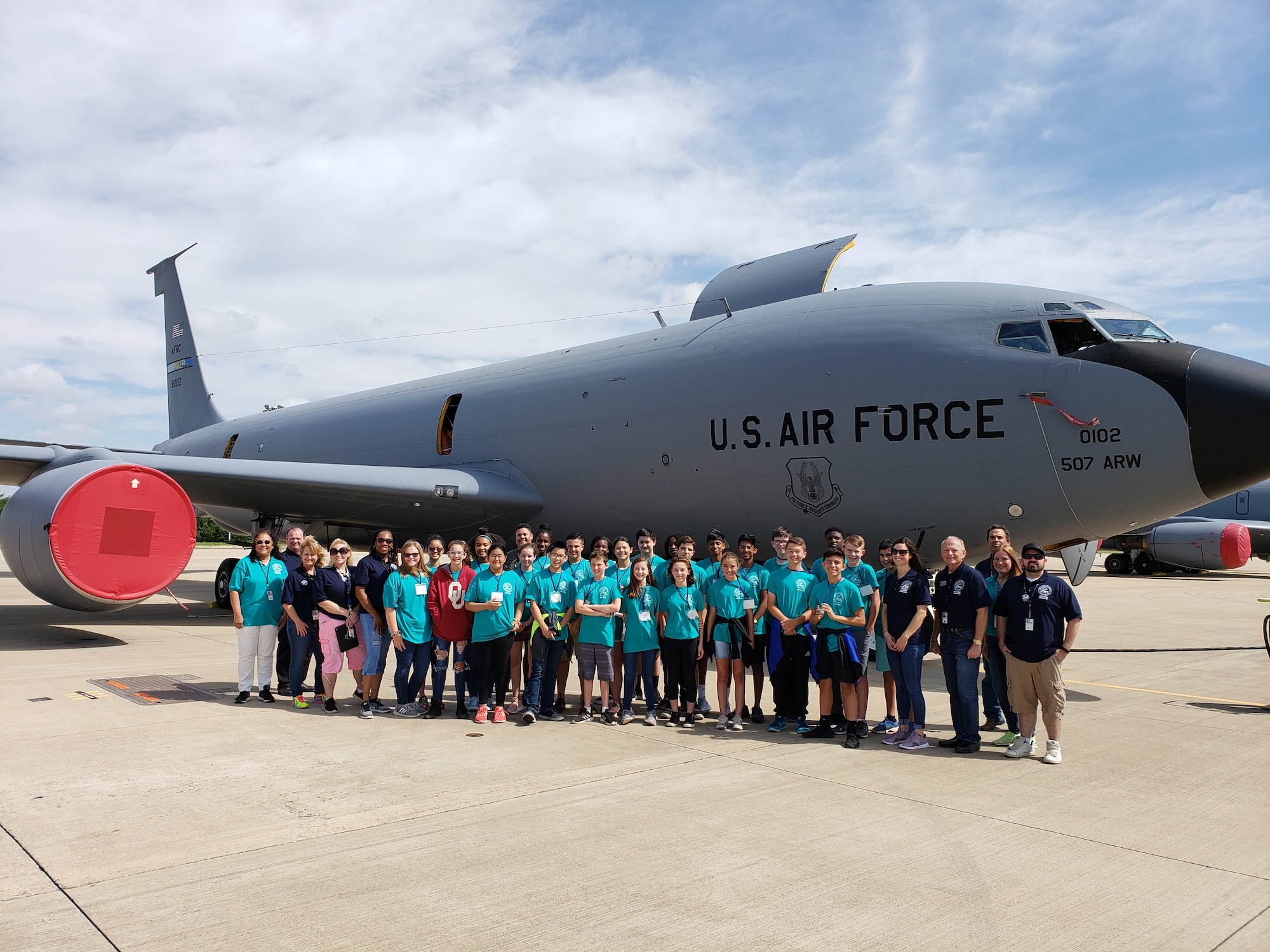 Students from the 2019 Aviation Career Education, or ACE Academy pose in front of a 507th Air Refueling Wing KC-135R Stratotanker, June 5, 2019.  Middle school kids experienced a weeklong immersion in a variety of aviation and aerospace professions. The students received hands-on briefings and tours from pilots operating the KC-135R Stratotanker, F-16 Fighting Falcon and the T-6 Texan II aircraft. (U.S. Air Force Photo by Maj. Jon Quinlan)