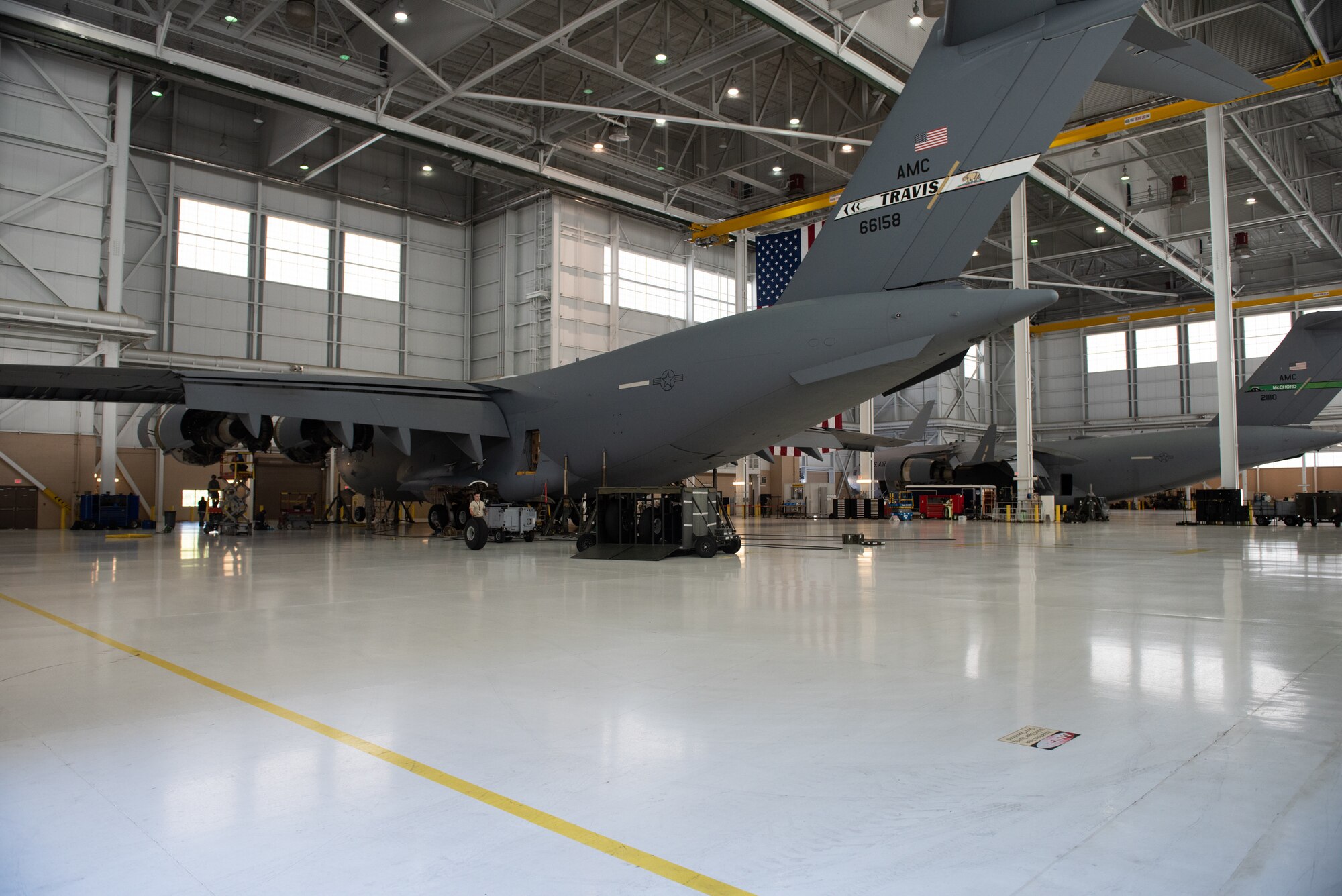 U.S. Air Force Airmen assigned to the 860th Aircraft Maintenance Squadron and 62nd Maintenance Squadron inspect a C-17 Globemaster III aircraft June 3, 2019, at Travis Air Force Base, California. The Airmen have completed 18 C-17 inspections since February. (U.S. Air Force photo by Tech. Sgt. James Hodgman)