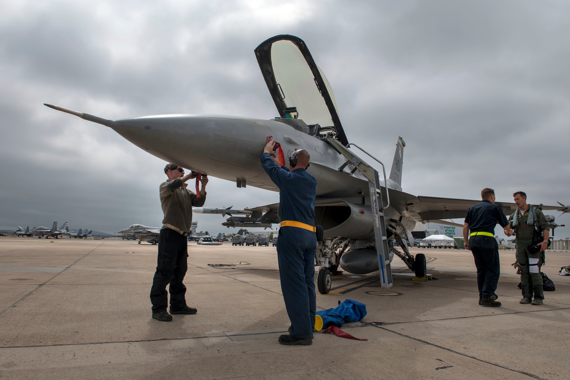 Airmen from the 314th Aircraft Maintenance Unit conduct post-flight maintenance on an F-16 Viper June 4, 2019, on Marine Corps Air Station Miramar, Calif. The 314th Fighter Squadron pilots conducted dissimiliar combat air training alongside F/A-18 Hornets from the Marine Fighter Attack Squadron 314. (U.S. Air Force photo by Staff Sgt. Christine Groening)