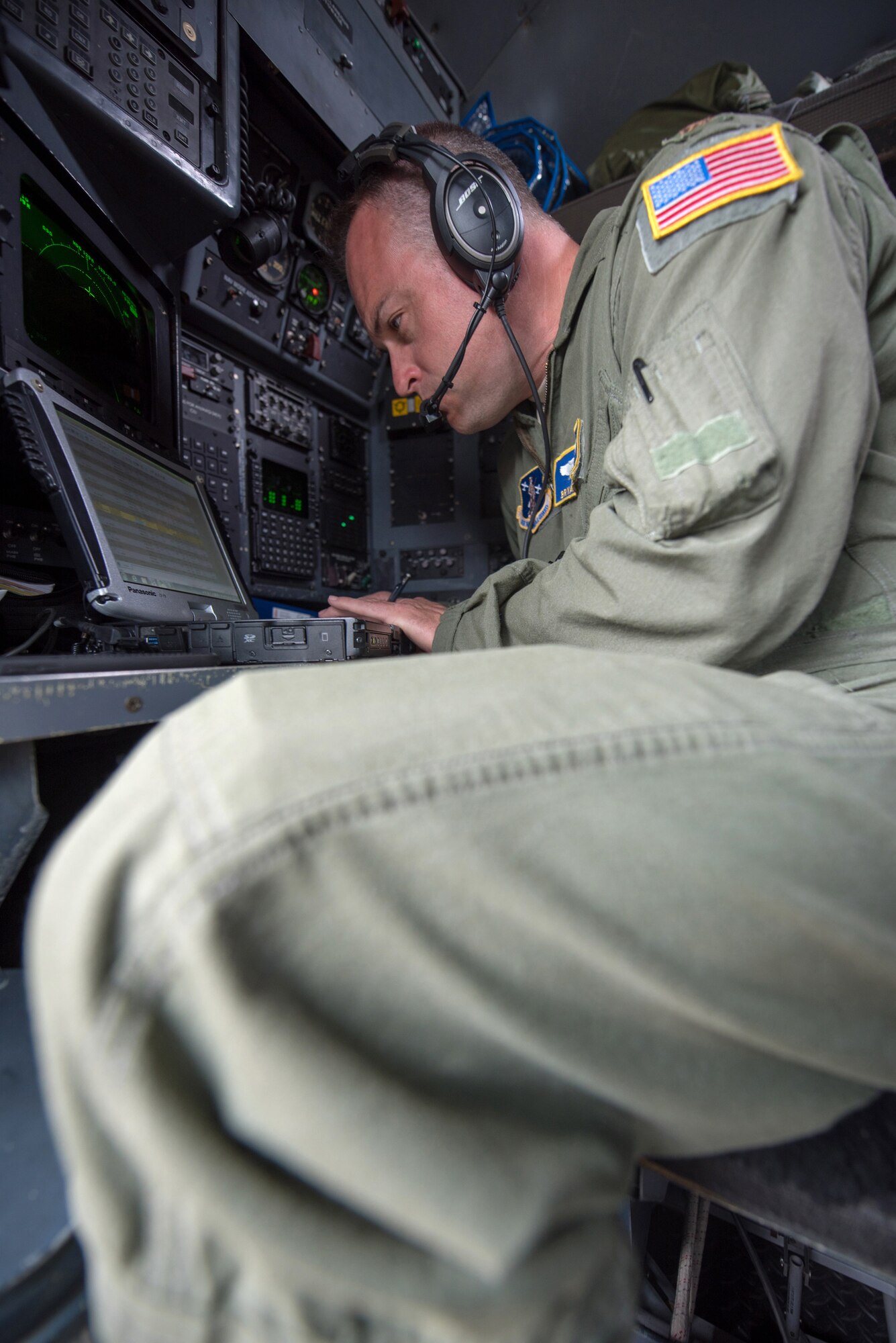 Maj. Bryan Keating, a navigator from the Kentucky Air National Guard's 165th Airlift Squadron, flies over the skies of Normandy, France, aboard a Kentucky Air Guard C-130 on June 4, 2019. Two C-130s and more than 30 Airmen from the Kentucky Air Guard’s 123rd Airlift Wing deployed from their base in Louisville, Ky., to participate in aerial events for the 75th anniversary of D-Day. The D-Day invasion, formally known as Operation Overlord, turned the tide of World War II in the European theater. (U.S. Air National Guard photo by Phil Speck)