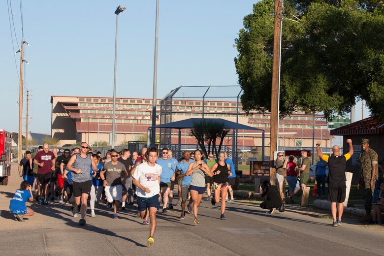 U.S. Marines, Sailors, and civilians participate in the 2019 Enviornmental Earth Day Fun Run on Marine Corps Air Station (MCAS) Yuma, April 26, 2019. The Environmental Earth Day Fun Run is a 5k race held annually bringing awareness to Marines, Sailors, and civilians about the protection of our enviornment. (U.S. Marine Corps photo by Sgt. Allison Lotz)