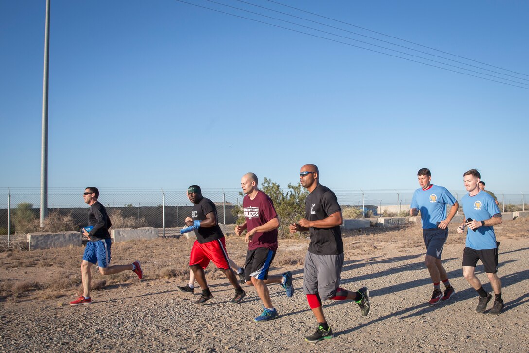 U.S. Marines, Sailors, and civilians participate in the 2019 Enviornmental Earth Day Fun Run on Marine Corps Air Station (MCAS) Yuma, April 26, 2019. The Environmental Earth Day Fun Run is a 5k race held annually bringing awareness to Marines, Sailors, and civilians about the protection of our enviornment. (U.S. Marine Corps photo by Sgt. Allison Lotz)