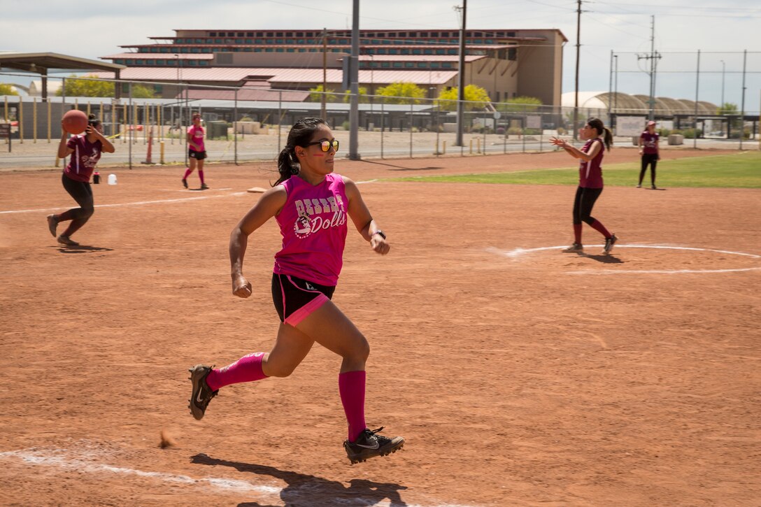 Spouses of U.S. Marines and sailors compete in the Spouses of Yuma Area Kickball Association (SYAKA) tournament on Marine Corps Air Station (MCAS) Yuma April 28, 2019. The purpose of SYAKA is to help spouses network, build camaraderie, while also having fun through physical activity. (U.S. Marine Corps photo by Sgt. Allison Lotz)