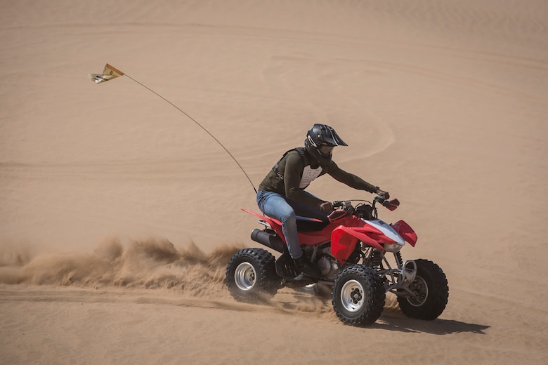 U.S. Marines with Marine Corps Air Station (MCAS) Yuma, ride 4x4 All-Terrain Vehicles and a Razor Side by Side through the Imperial Sand Dunes in El Centro Calif., April 29, 2019. MCCS Arizona Adventures is located aboard MCAS Yuma, affording Marines the opportunity to rent out an assortment of adrenaline-fueled gear including boats, jet skis, kayaks, and more. (U.S. Marine Corps photo by Sgt. Allison Lotz)