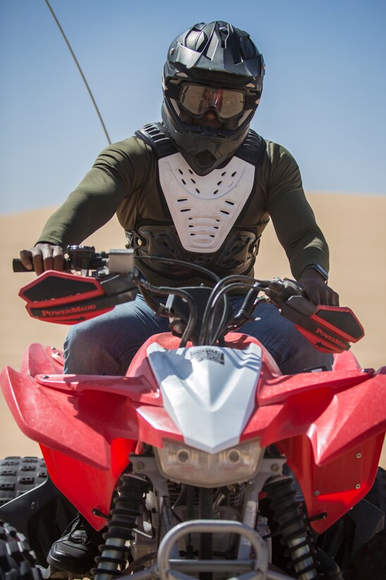 U.S. Marines with Marine Corps Air Station (MCAS) Yuma, ride 4x4 All-Terrain Vehicles and a Razor Side by Side through the Imperial Sand Dunes in El Centro Calif., April 29, 2019. MCCS Arizona Adventures is located aboard MCAS Yuma, affording Marines the opportunity to rent out an assortment of adrenaline-fueled gear including boats, jet skis, kayaks, and more. (U.S. Marine Corps photo by Sgt. Allison Lotz)