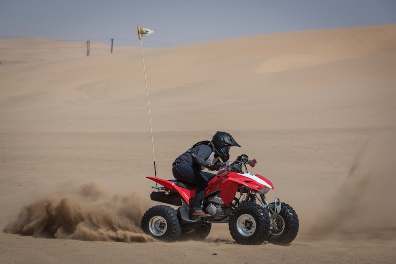 U.S. Marines with Marine Corps Air Station (MCAS) Yuma, ride 4x4 All-Terrain Vehicles and a Razor Side by Side through the Imperial Sand Dunes in El Centro Calif., April 29, 2019. MCCS Arizona Adventures is located aboard MCAS Yuma, affording Marines the opportunity to rent out an assortment of adrenaline-fueled gear including boats, jet skis, kayaks, and more. (U.S. Marine Corps photo by Sgt. Allison Lotz)