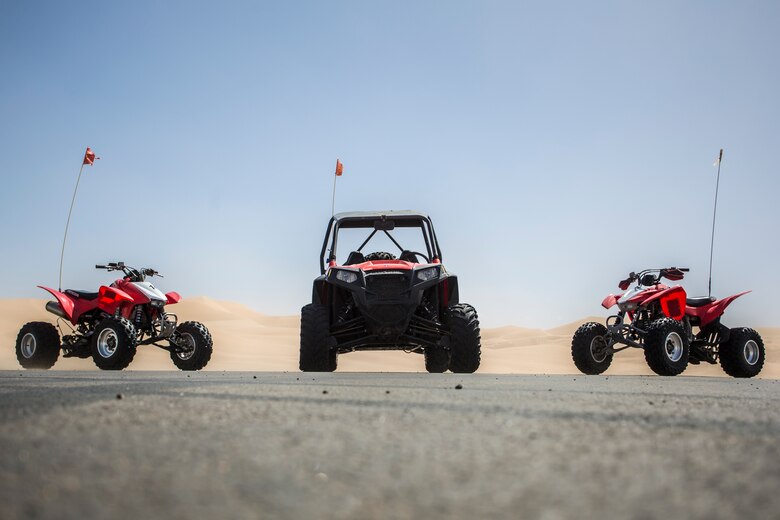 U.S. Marines with Marine Corps Air Station (MCAS) Yuma, ride 4x4 All-Terrain Vehicles and a Razor Side by Side through the Imperial Sand Dunes in El Centro Calif., April 29, 2019. MCCS Arizona Adventures is located aboard MCAS Yuma, affording Marines the opportunity to rent out an assortment of adrenaline-fueled gear including boats, jet skis, kayaks, and more. (U.S. Marine Corps photo by Sgt. Allison Lotz)