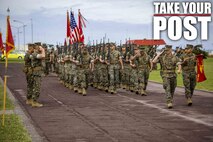Leadership with Combat Logistics Regiment 35, 3rd Marine Logistics Group, render a salute while being honored during pass and review at a relief and appointment ceremony May 31, 2019, at Camp Kinser, Okinawa, Japan. Sgt. Maj. Kenneth A. Miller ceremoniously transferred accountability and authority of enlisted Marines to Sgt. Maj. John R. Preston during the ceremony. Miller, the outgoing regimental sergeant major of CLR-35, 3rd MLG, is a native of Woodland, California. Preston, the incoming regimental sergeant major of CLR-35, 3rd MLG, is a native of Easley, South Carolina. (U.S. Marine Corps photo by Lance Cpl. Terry Wong)