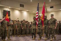 U.S. Marines with Combat Logistics Regiment 37, 3rd Marine Logistics Group, march on the regimental colors during a change of command ceremony June 7, 2019, at Camp Kinser, Okinawa, Japan. Col. Scott R. Johnson, a native of Talkeetna, Alaska, relinquished command of CLR-37, 3rd MLG, to Col. Omar J. Randall, a native of Bronx, New York, during the ceremony. (U.S. Marine Corps photo by Lance Cpl. Terry Wong)