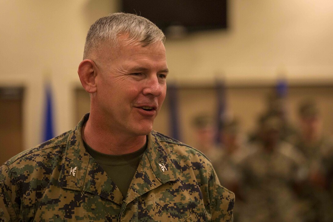 U.S. Marine Corps Col. Scott R. Johnson addresses guests during a change of command ceremony June 7, 2019, at Camp Kinser, Okinawa, Japan. Johnson, a native of Talkeetna, Alaska, relinquished command of Combat Logistics Regiment 37, 3rd Marine Logistics Group, to Col. Omar J. Randall, a native of Bronx, New York, during the ceremony. (U.S. Marine Corps photo by Lance Cpl. Terry Wong)