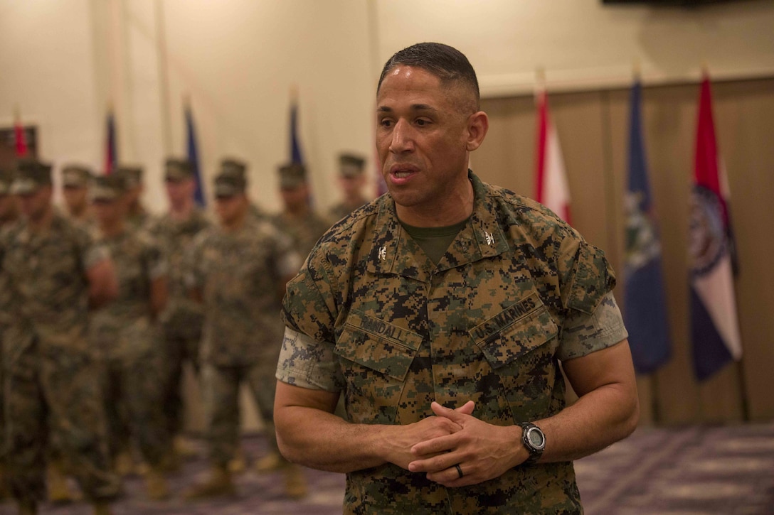 U.S. Marine Corps Col. Omar J. Randall addresses guests during a change of command ceremony June 7, 2019, at Camp Kinser, Okinawa, Japan. Col. Scott R. Johnson, a native of Talkeetna, Alaska, relinquished command of Combat Logistics Regiment 37, 3rd Marine Logistics Group, to Randall, a native of Bronx, New York, during the ceremony. (U.S. Marine Corps photo by Lance Cpl. Terry Wong)