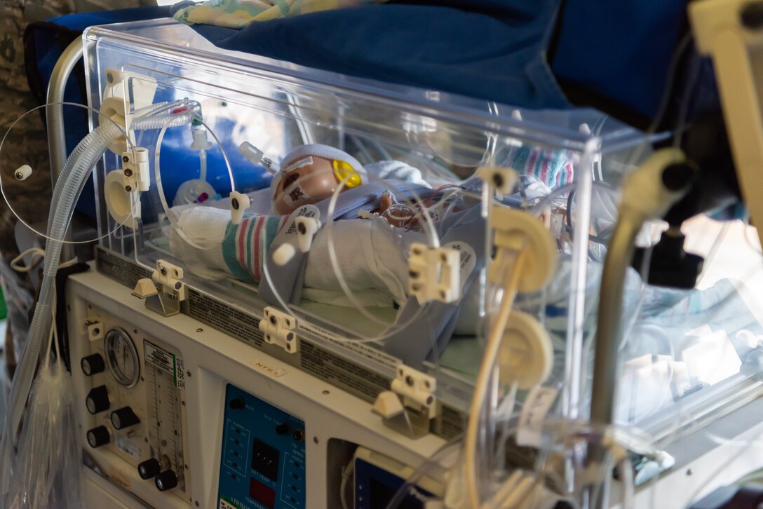 The mannequin of an infant patient lies inside the neonatal transport system during a Neonatal Intensive Care Unit transportation course June 5, 2019, on Kadena Air Base, Japan. The NICU transportation course goes over the roles and responsibilities necessary when transporting an infant patient, what to expect, and what is essential to carry out the mission successfully. (U.S. Air Force photo by Airman 1st Class Cynthia Belío)