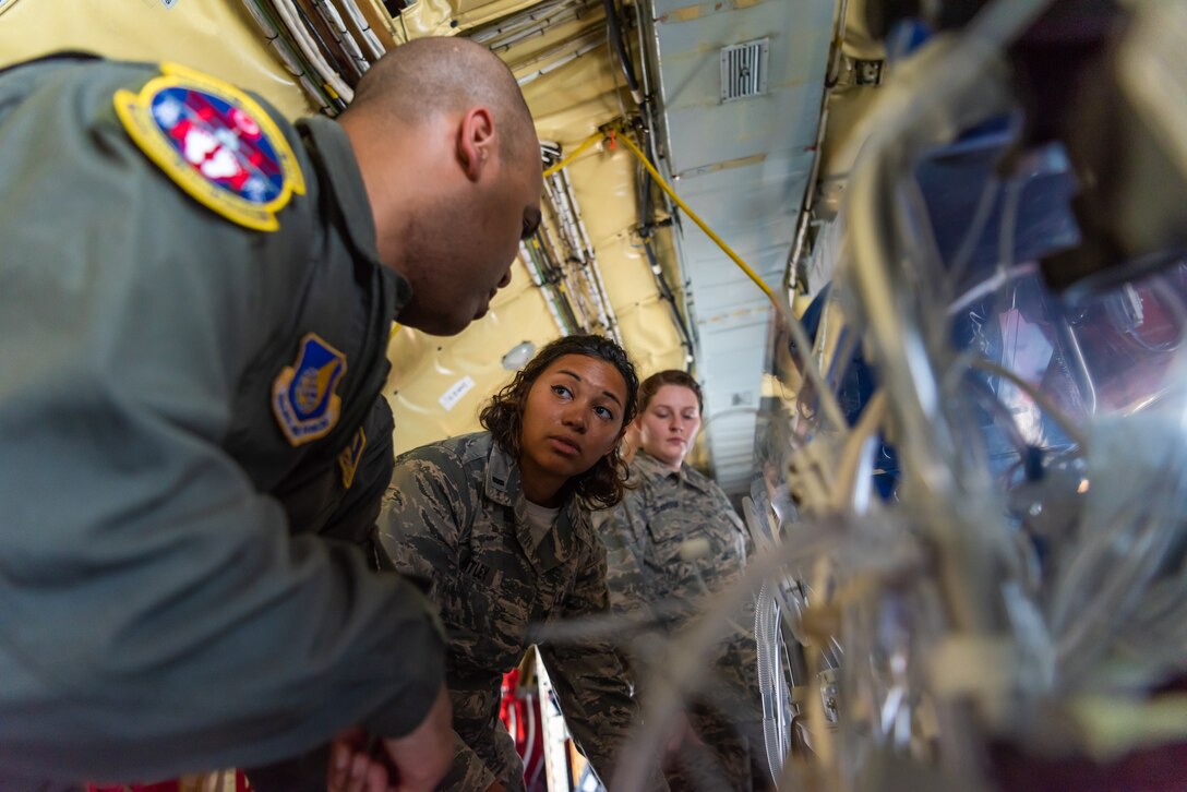 U.S. Air Force 1st Lt. Mackenzie Antley, Neonatal Intensive Care Unit nurse assigned to the 18th Medical Operations Squadron, discusses vital signs during a NICU transportation course June 5, 2019, on Kadena Air Base, Japan. The NICU transportation course goes over the roles and responsibilities necessary when transporting an infant patient, what to expect, and what is essential to carry out the mission successfully. (U.S. Air Force photo by Airman 1st Class Cynthia Belío)