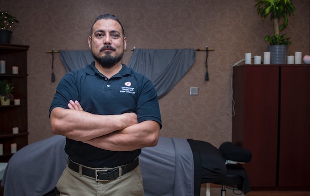 Retired U.S. Army Staff Sgt. Eduardo Duran Jr., a licensed massage therapist, helps services members work through their stressors by connecting their minds back to their bodies through massage at Joint Base Langley-Eustis, Virginia.