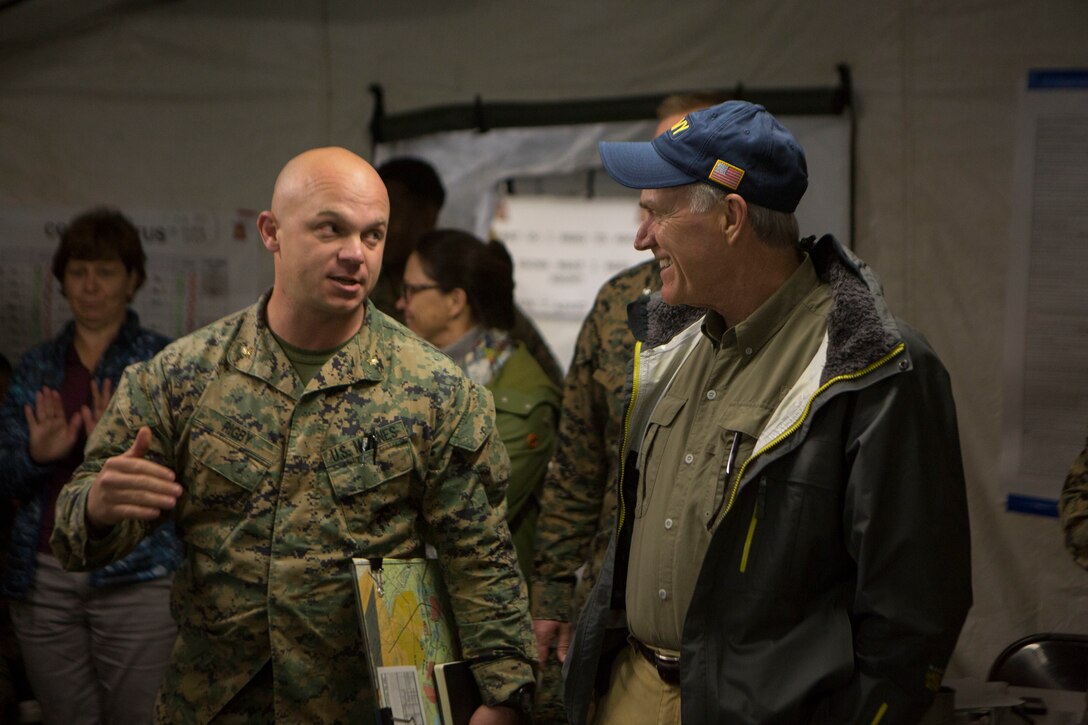 A U.S. Marine with Marine Rotational Force-Europe 19.2, Marine Forces Europe and Africa, briefs Secretary of the Navy Richard V. Spencer during exercise Thunder Reindeer 19 at Setermoen, Norway, June 5, 2019. Thunder Reindeer 19 is a multilateral, combined-arms, live-fire exercise that improves interoperability between the Norwegian Armed Forces and U.S. Marine Corps. (U.S. Marine Corps photo by Sgt. Williams Quinteros)