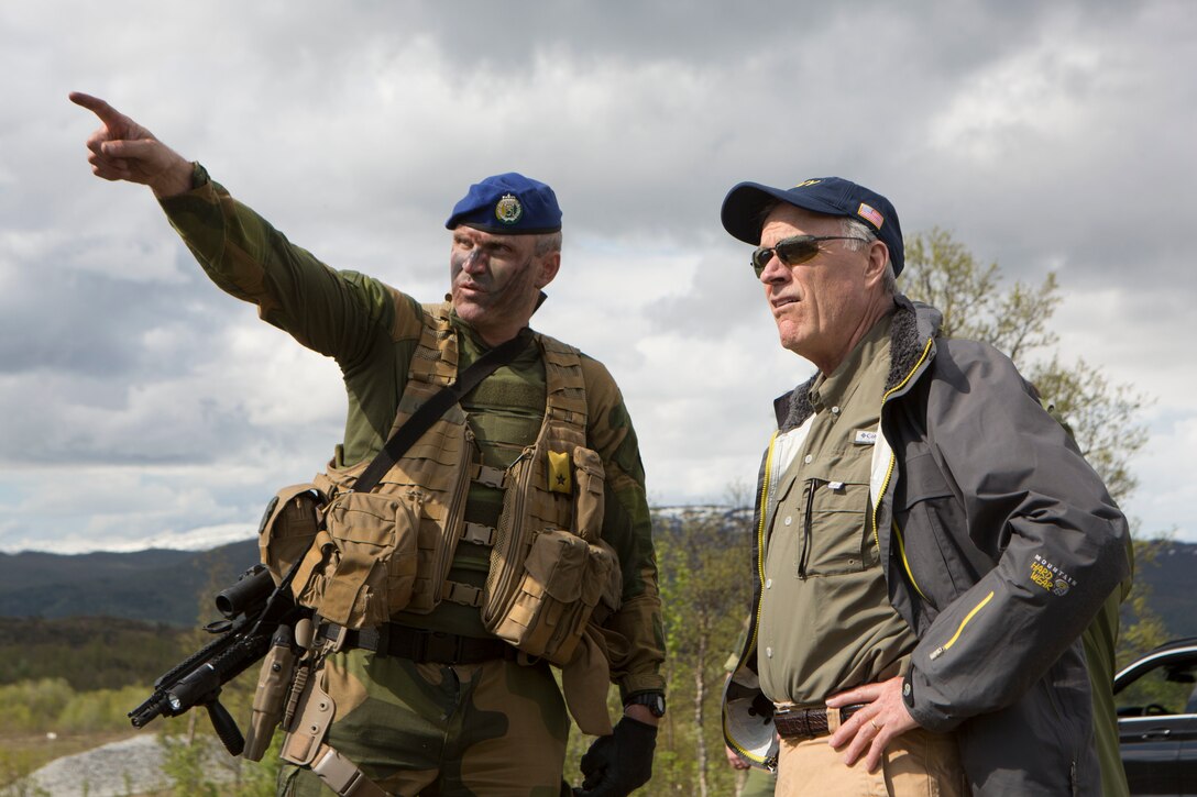 Secretary of the Navy Richard V. Spencer speaks to Brig. Gen. Lars Lervik, commander of the Norwegian Brigade North, while visiting U.S. service members with Marine Rotational Force-Europe 19.2, Marine Forces Europe and Africa, during exercise Thunder Reindeer 19 at Setermoen, Norway, June 5, 2019. Thunder Reindeer 19 is a multilateral, combined-arms, live-fire exercise that improves interoperability between the Norwegian Armed Forces and U.S. Marine Corps. (U.S. Marine Corps photo by Sgt. Williams Quinteros)