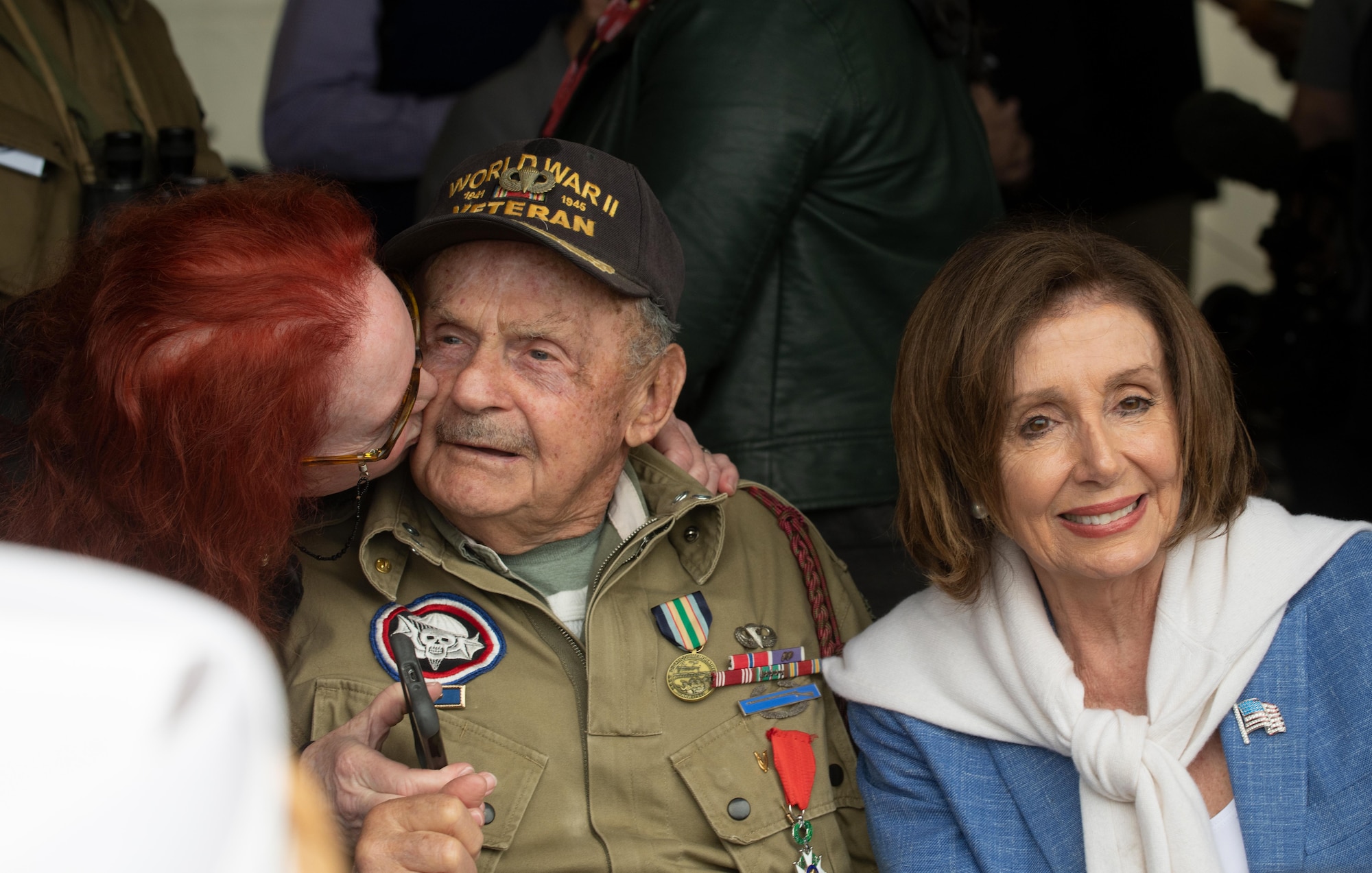 World War II veteran Dan McBride (or George Merz) and U.S. House of Representatives president Nancy Pelosi pose for a photo at the D-Day 75 Commemorative Airborne Operation in Sainte-Mere-Eglise, France, June 9, 2019, which honors the epic airborne operation conducted by Allied forces on June 6, 1944. This commemorative airborne operation was an opportunity for multinational forces to honor the past and simultaneously work to secure the future. Training together in the very same place that trans-Atlantic resolve began 75 years ago demonstrates the partnerships and bonds that we highly value and continue to benefit from to this day. (U.S. Air Force photo by Airman 1st Class Jennifer Zima)