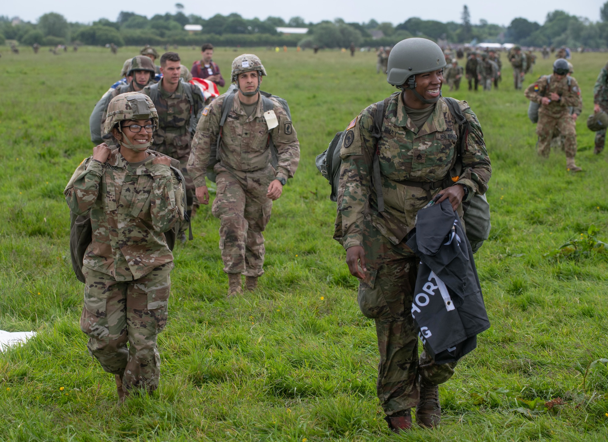 Service members leave the drop zone after a jump during the D-Day 75 Commemorative Airborne Operation in Sainte-Mere-Eglise, France, June 9, 2019, which honors the epic airborne operation conducted by Allied forces on June 6, 1944. Seventy-five years later, the bravery and heroism by all allies during World War II continues to resonate with U.S. forces in Europe - who remain steadfast in their commitment to European allies and partners. (U.S. Air Force photo by Airman 1st Class Jennifer Zima)