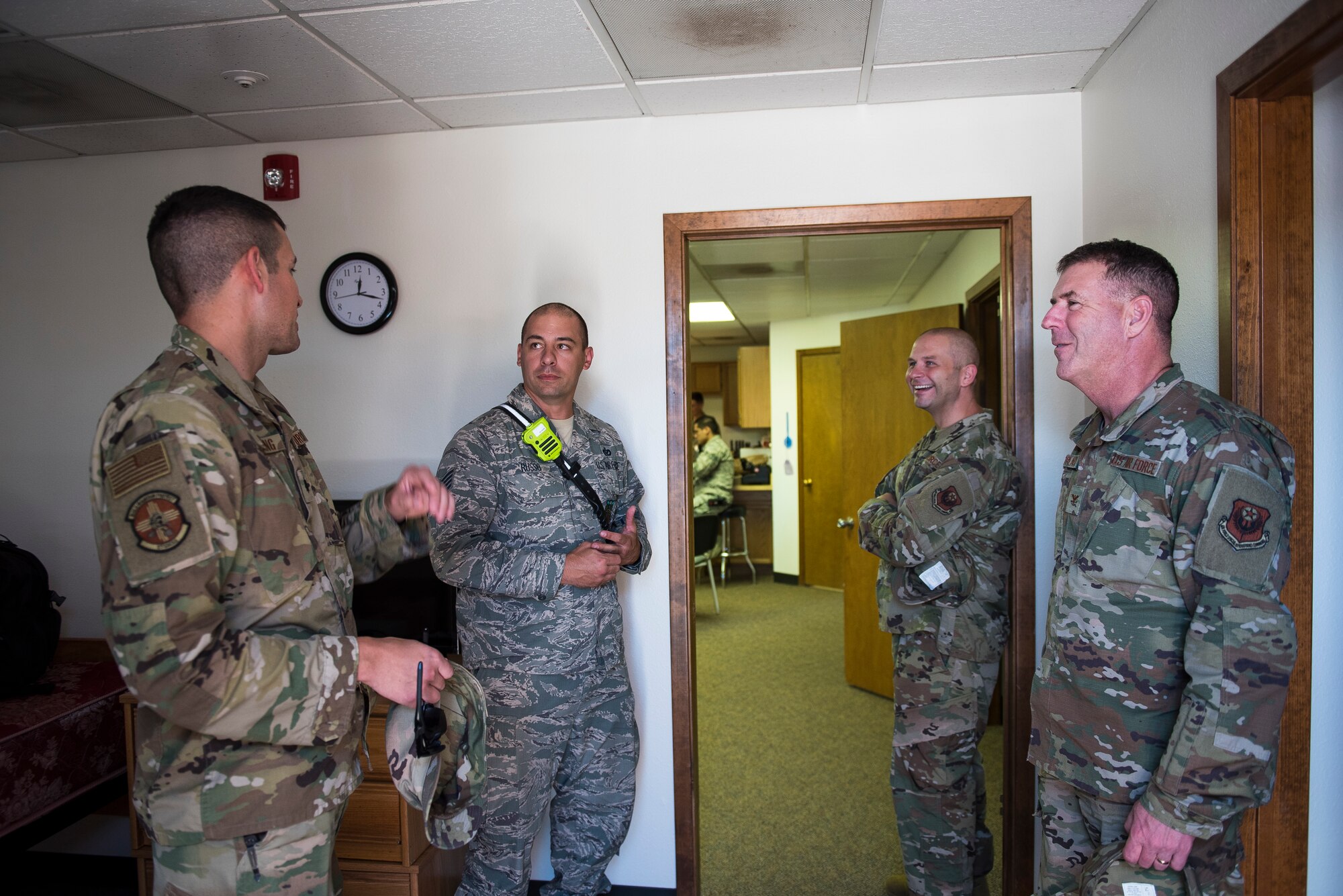 Staff Sgt. Danny Russo, 27th Special Operations Civil Engineer Squadron firefighter crew chief, gives a tour to the new fire station to wing leadership at Cannon Air Force Base, N.M., June 6, 2019. The station was built with the intention of holding four firefighters, to complement the standard fire engine in its garage. (U.S. Air Force Photo by Airman 1st Class Vernon R. Walter III)