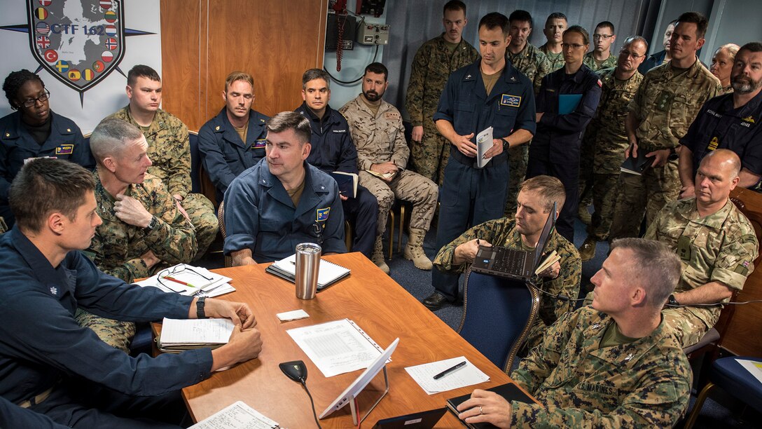 Maj. Gen. Stephen Neary, commanding general, 2nd Marine Expeditionary Brigade (left) and Rear Adm. Brad Skillman, commander, Expeditionary Strike Group 2 (right) conduct a commander’s update brief aboard the Blue Ridge-class command and control ship USS Mount Whitney during Exercise Baltic Operation 2019. BALTOPS is the premier annual maritime-focused exercise in the Baltic Region, marking the 47th year of one of the largest exercises in Northern Europe enhancing flexibility and interoperability among allied and partner nations. (U.S. Navy photo by Mass Communication Specialist 1st Class Theodore Green)