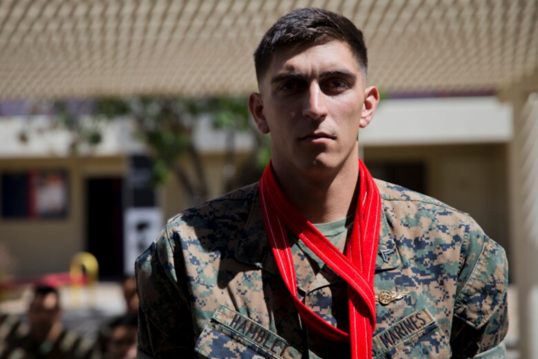 U.S. Marine Corps Cpl. Anthony L. Hamblet, a Crew chief assigned to Marine Corps Air Station (MCAS) Yuma, Headquarters & Headquarters Squadron (H&HS) Search and Rescue, receives blood stripes during a Blood Stripe Ceremony at MCAS Yuma Ariz., May 1, 2019. The blood stripe honors the blood that was shed by Marine officers and noncommissioned officers (NCO) during the Battle of Chapultepec in 1847. The blood stripes are worn on the trousers of NCOs Staff NCOs, and officers in remembrance of those who courageously fought in the battle. (U.S. Marine Corps photo by Lance Cpl. Joel Soriano)