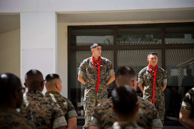U.S. Marines assigned to Marine Corps Air Station (MCAS) Yuma Headquarters & Headquarters Squadron (H&HS) receive their blood stripes during a Blood Stripe Ceremony at MCAS Yuma Ariz., May 1, 2019. The blood stripe honors the blood that was shed by Marine officers and noncommissioned officers (NCO) during the Battle of Chapultepec in 1847. The blood stripes are worn on the trousers of NCOs Staff NCOs, and officers in remembrance of those who courageously fought in the battle. (U.S. Marine Corps photo by Lance Cpl. Joel Soriano)